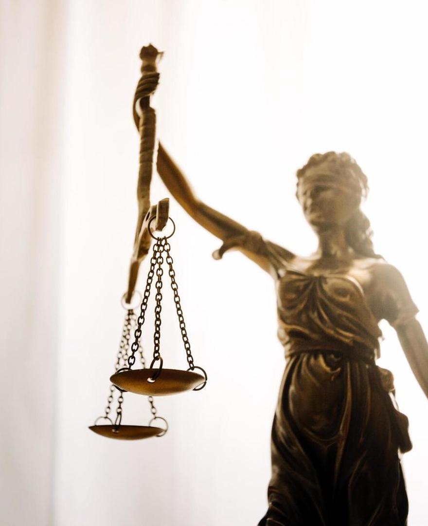 Scales of justice in the firm’s Dallas office